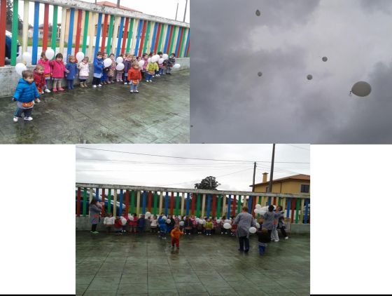 nenos e nenas da escola lanzando globos ao ceo en conmemoración do día da paz